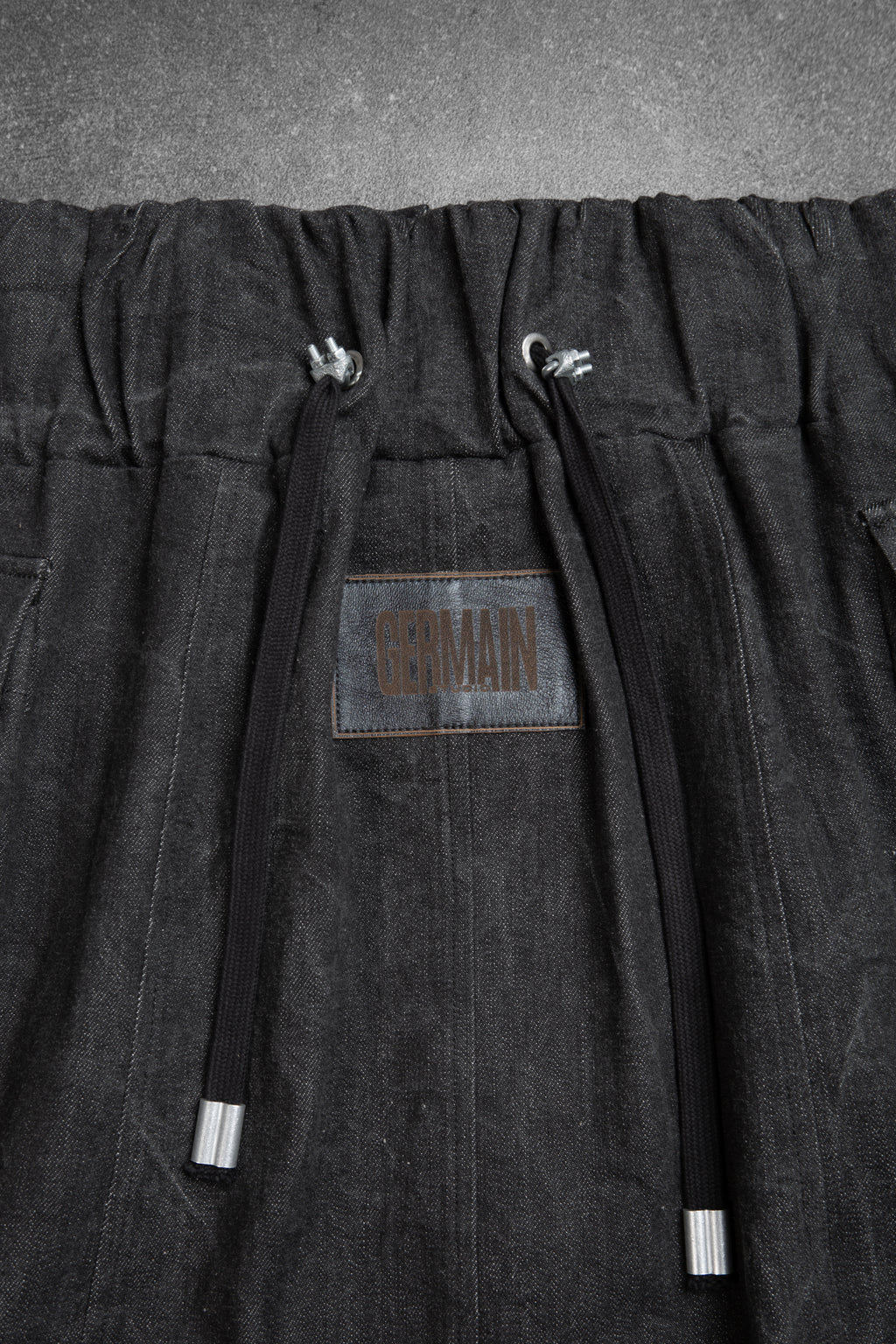 CARGO ZIPPER SKIRT WASHED BLACK DENIM